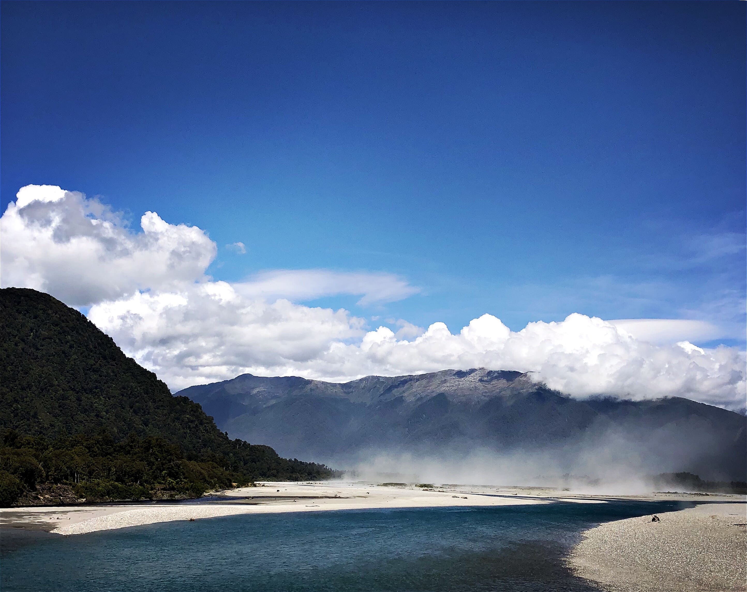 A view of the mountains and river near Haast, a UNESCO World Heritage site.