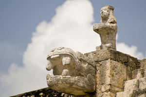 Stone carvings stand out against gathering clouds near the Temple of the Warriors at the Yucatán Peninsula's Mayan ruins of Chichén Itzá.