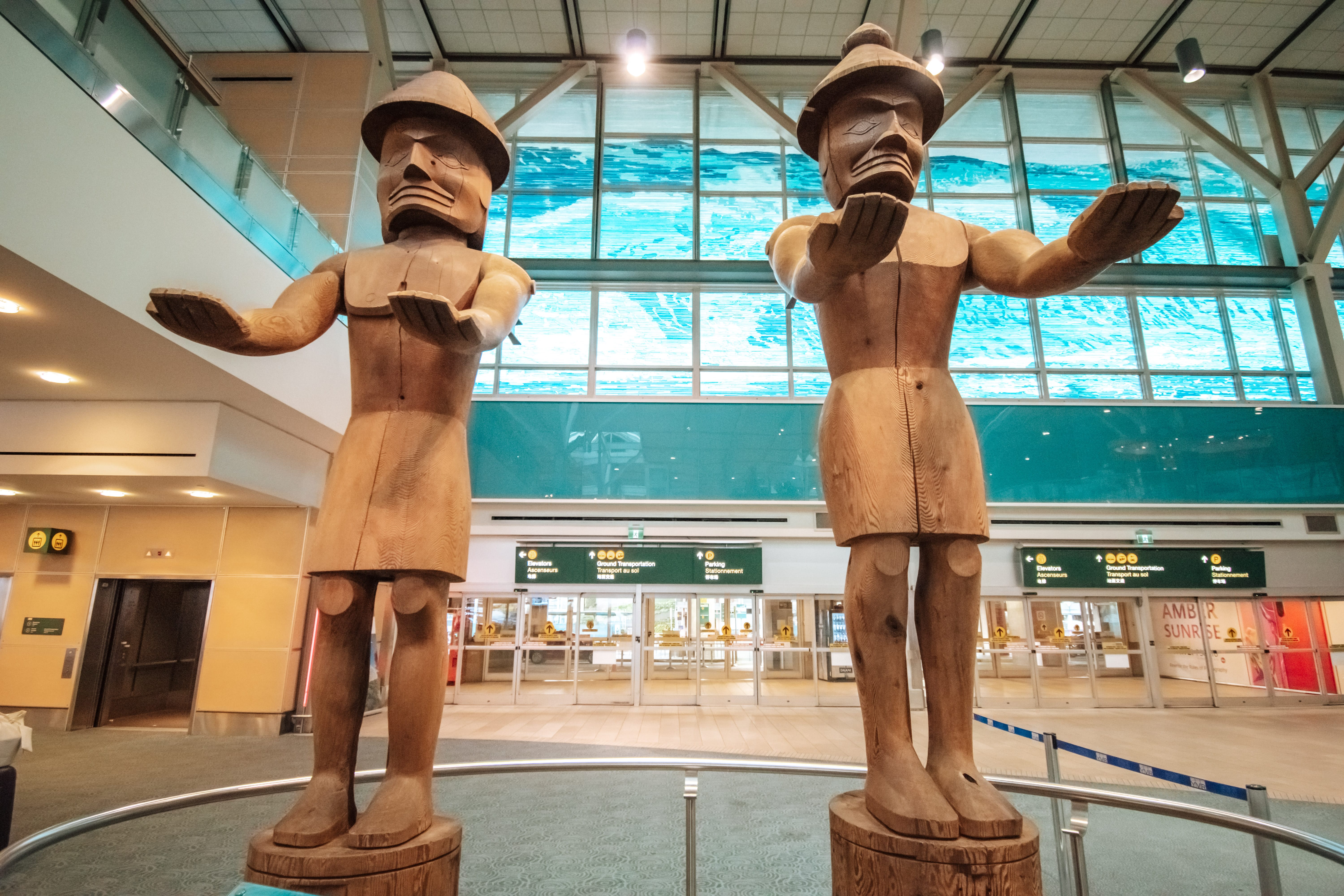 Welcome Figures by Joe David, 1986, at the Vancouver International Airport.