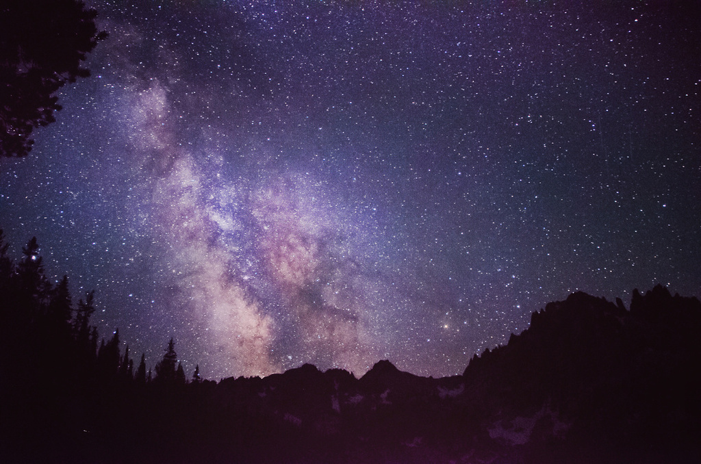 The Great PNW - Camping, Hiking, Hot Springs, and Other Things to do in the PNW. The Milky Way over the ridge surrounding Alpine Lake in Idaho's Sawtooth National Recreation Area.
